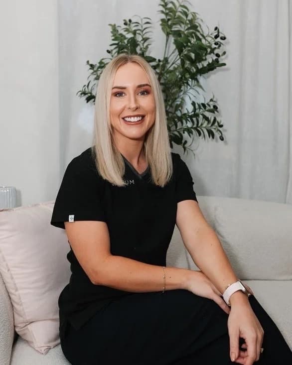 April, owner of Platinum By April, in her clinic